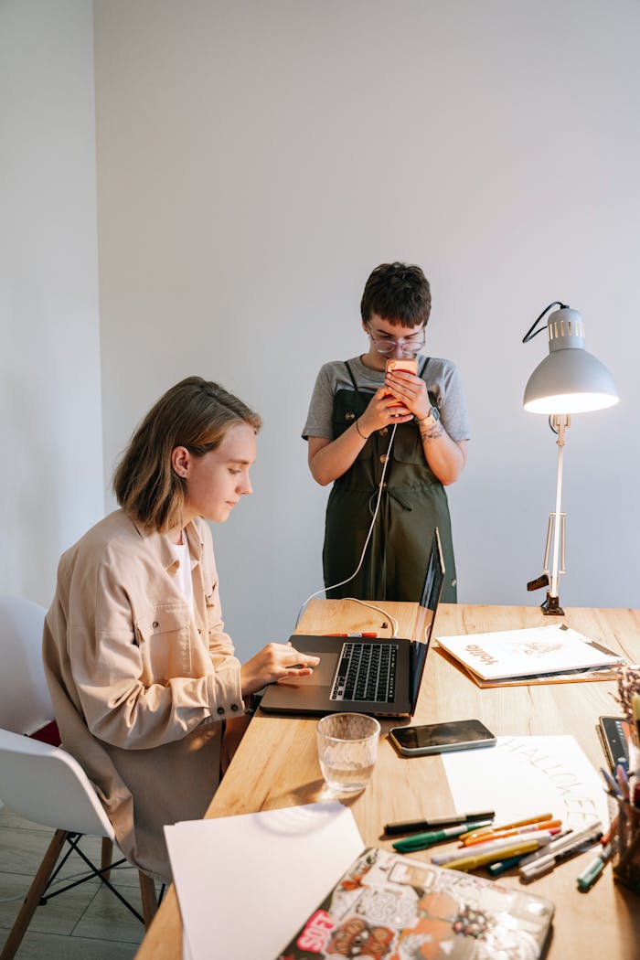 why-choose-us Young professionals working collaboratively in a modern coworking space.